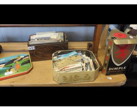An unopened bottle of Dimple Scotch Whiskey, together with collectable cards