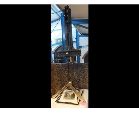 An antique radial easel by Newton Ltd