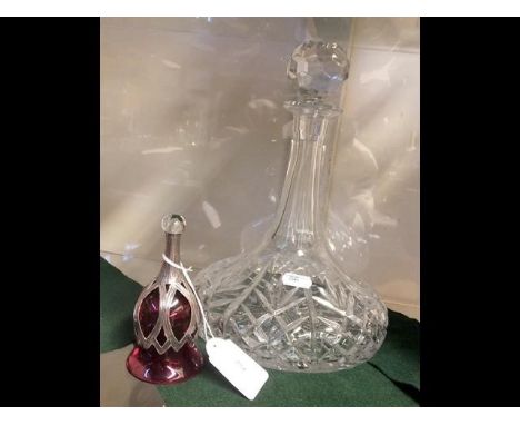 A vintage Sileda silver overlay cranberry coloured bell, together with a cut glass decanter