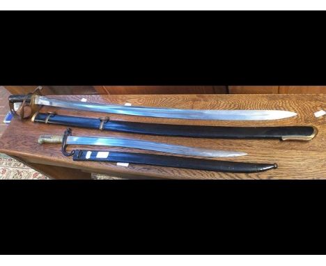 An antique sword bayonet with metal scabbard together with a reproduction swordCONDITION REPORTBy our judgement, condition of