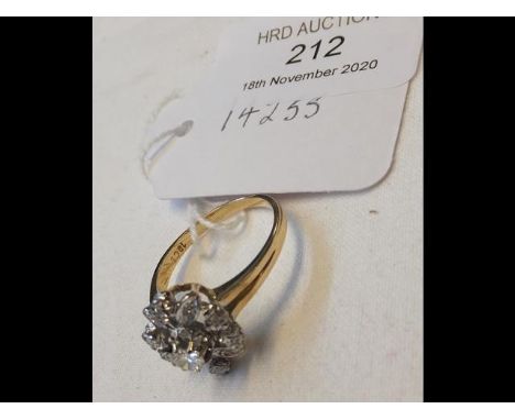 A diamond cluster ring set in the form of a flower in 18ct gold setting - size P