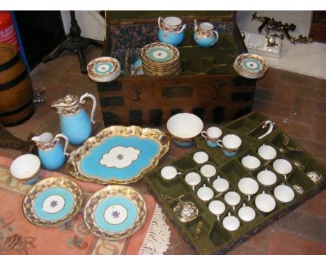 An extensive 19th century dinner and tea service in fitted metal bound trunk - the two handled serving tray marked 'Sharpus &