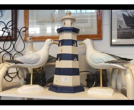 A wooden lighthouse table lamp, seagulls