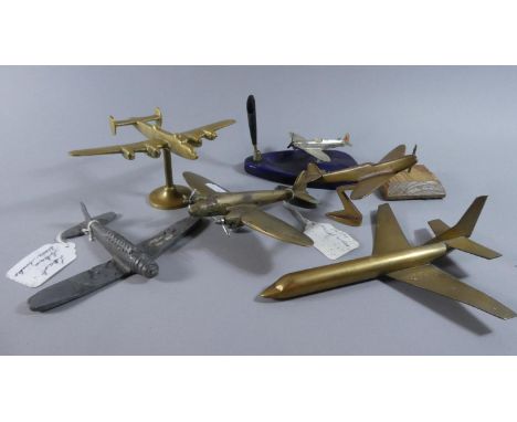A Collection of Four Vintage Brass Aircraft Models, One Lead Model of a Skua Dive Bomber and a Spitfire Pen Rest 