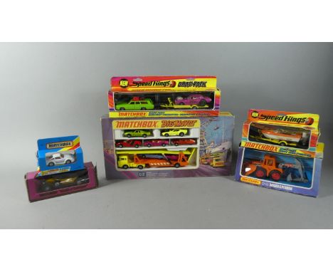 A Collection of Six Boxed Matchbox Cars and Trucks to include K-25 Boat and Trailer, K25 Digger and Plough, Y-15 1930 Packard