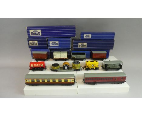 A Collection of OO Gauge Boxed Hornby Dublo Coaches and Wagons to include D14 Suburban Brake 3rd, D12 Corridor, Brake 3rd D1,