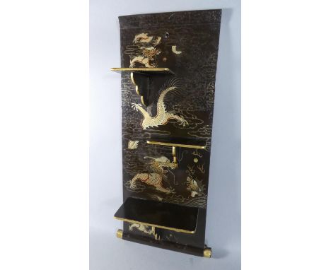 A Lacquered Wall Hanging Oriental Three Tier Shelf, Decorated in Gilt With Dragons and Flaming Pearls, 58cm High 