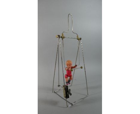A Vintage Clockwork Automaton Gymnast Toy 