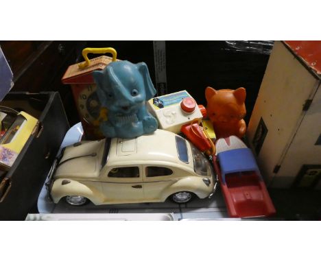 A Collection of Miscellaneous Toys to include V.W Beetle, Fisher Price Music Box Movie Camera with Discs, Money Boxes Etc 