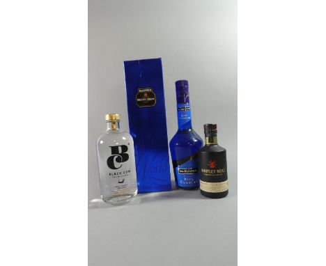 Two Bottles of Gin, One Blue Curacao and Bottle of Harvey Bristol Cream Sherry 