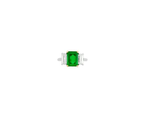 One emerald-cut emerald weighing 2.32 cts., 2 emerald-cut diamonds ap. 1.50 cts., signed Bulgari, no. C3297. Size 5 1/2. With