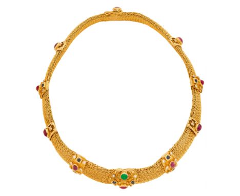 18 kt., braided mesh, 10 oval cabochon rubies, one round cabochon emerald, 10 small round sapphires, 38 round diamonds ap. 1.