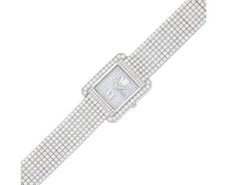 18 kt., quartz, rectangular single-cut diamond-set dial, applied chrome Roman numerals at the half hour, case diameter ap. 31