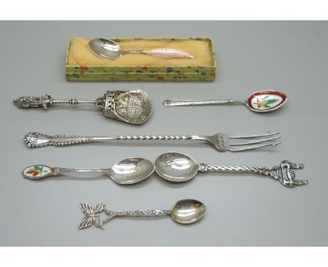 A silver pickle fork, five silver spoons including three enamel and a caddy spoon, 57g 