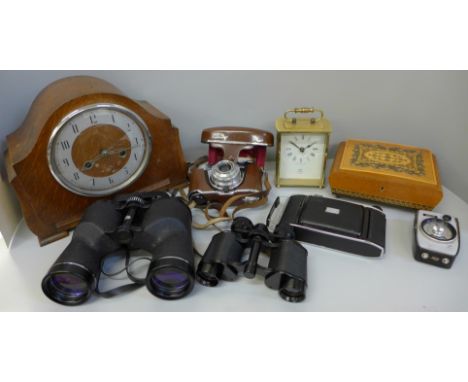 Two pairs of binoculars, a chiming mantel clock, two cameras, a light meter and a musical jewellery box 