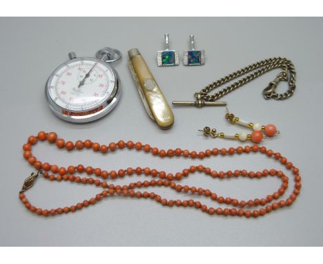 A stop watch, a coral necklace, a pair of silver and opal cufflinks, a pair of drop earrings and a silver and mother of pearl