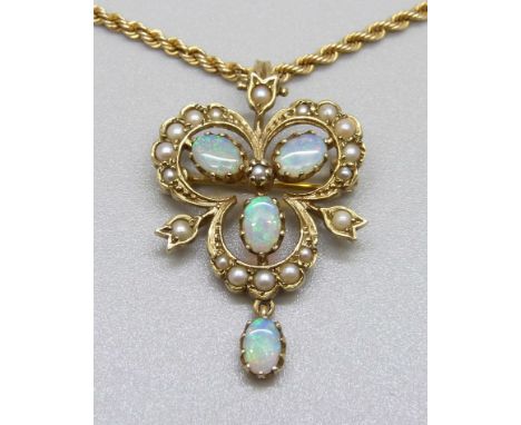 A 9ct gold, opal and pearl pendant/brooch on a 9ct gold chain, 7.3g 