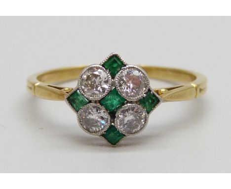 An 18ct gold, emerald and diamond ring, 1.8g, N 