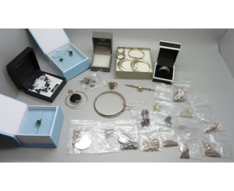 A collection of silver jewellery including a baby's bangle, and two boxed 'Crystal Chain' items 