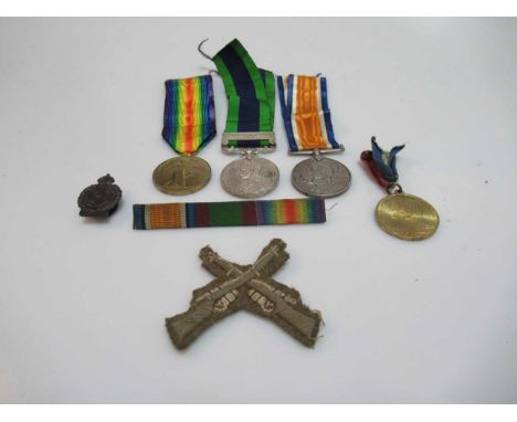 An Indian General Service Medal (1909 IGSM) with 1919 Afghanistan bar, together with a WW1 medal duo (war medal and victory m