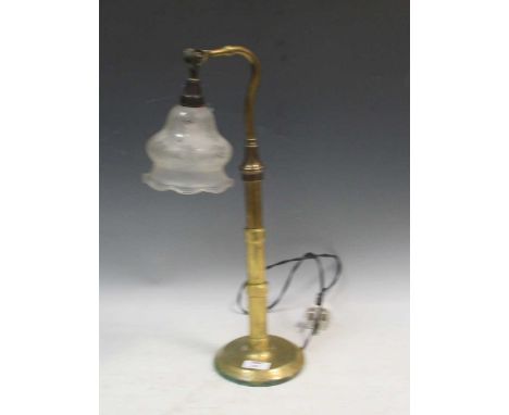 A 20th century brass desk lamp with shaped glass shade 51cm high