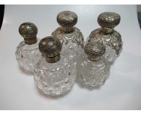 Two pairs of silver topped glass dressing table jars and another smaller example (5)