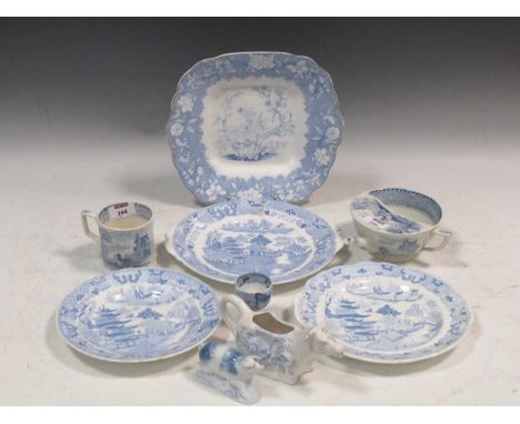 An English ceramic blue and white invalid feeding cup, a ceramic pig and a similar mug and egg cup (4)
