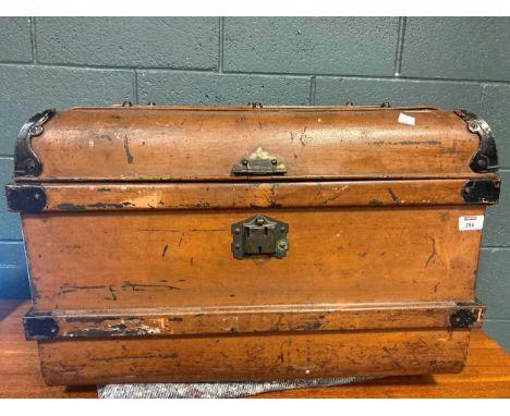 An early 20th century painted tin trunk with moulding features (catch broken)Condition report: Measurements: 48 x 71 x 51cm