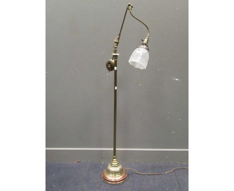An Edwardian brass cantaliver reading lamp with glass shade on a domed brass and copper base 148cm high approxCondition repor