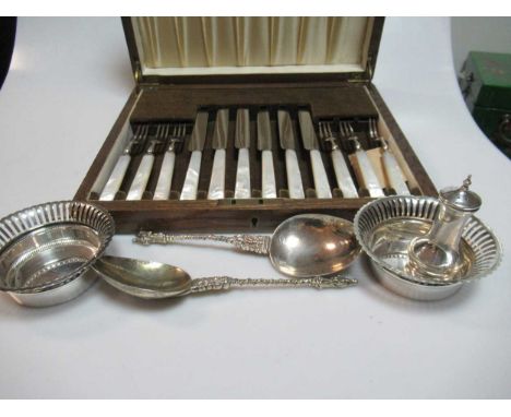 A pair of silver bon bon dishes, a cased set of six silver teaspoons with enamel decoration, a cased set of 6 pairs of fish e