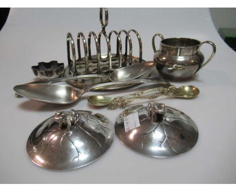 A collection of silverware including toast rack, tablespoons, waiter, salt etc together with a pair of German silver spoons, 