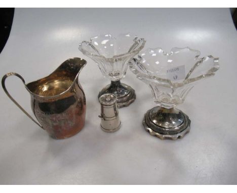 A pair of continental glass dishes with silver bases, a silver cream jug in Regency style and milk churn pepperette