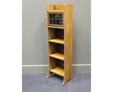 A Liberty London narrow bookcase together with a wall hanging shelf and a brass water jug (3)Condition report: 115cm high, 34