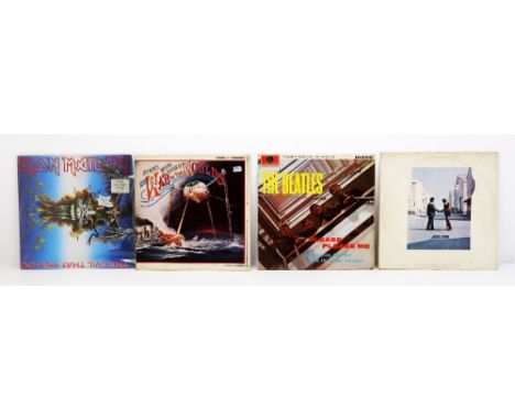 A large collection of mostly LP Records. Including Rock, Metal, Pop, 60s to 90s. Including Iron Maiden, Black Sabbath, Led Ze