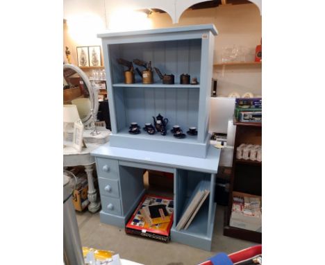 A blue painted pine desk. (110cm x 51cm x Height 77cm). Shelf brackets missing from shelves. Plus matching bookcase  COLLECT 