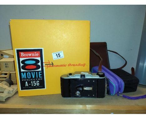 An unboxed Brownie 8 movie projector &amp; a quantity of camera's COLLECT ONLY