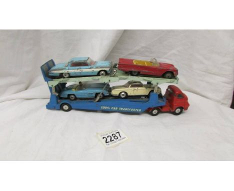 A Corgi Bedford Carrimore car transporter and 4 cars including VW, Ford, Mercedes etc.,