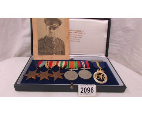 Two WW2 medals, five stars and a Queen Elizabeth II Army Emergence Reserve medal.