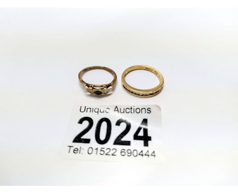 A 9ct gold half eternity ring, size O and another 9ct gold ring, size K. 3.9 grams.