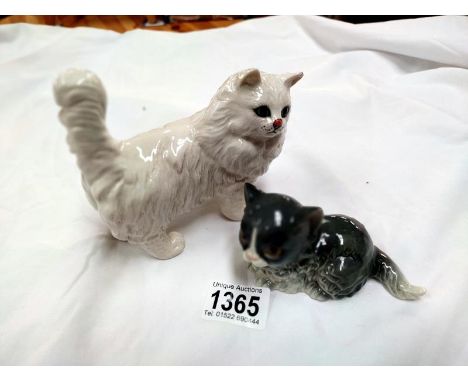 A Goebel kitten and a Beswick cat (rough edge to glaze on left ear)