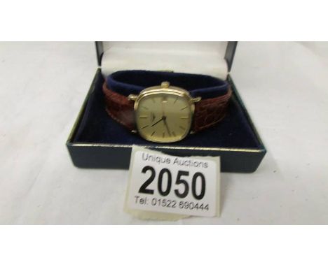 A gold plated manual Longines wrist watch in working order.
