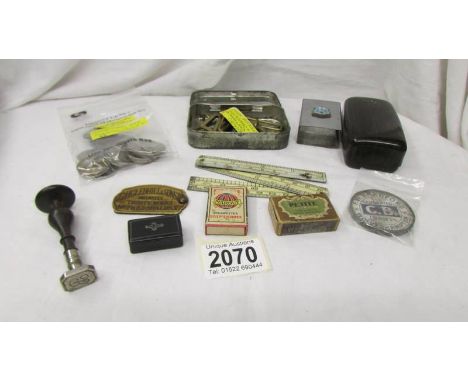 A mixed lot including brass buckles, miniature snuff box, coins, match boxes etc.,