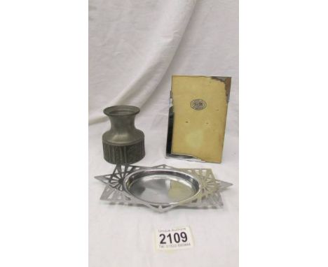 An Art Deco chrome photo frame, a Norway pewter candlestick and a dish.