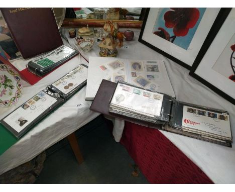4 folders of First Day Covers