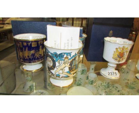 Five Coalport and Two Royal Worcester commemorative goblets.