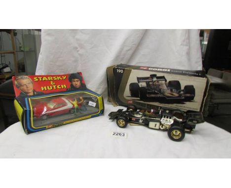 A Corgi 292 Starsky &amp; Hutch Ford (missing 1 figure) and a Corgi 190 JPS Lotus Formula 1.