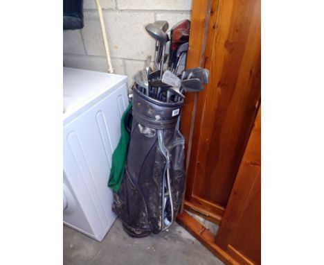 An old golf bag and set of clubs including John Letters master model
