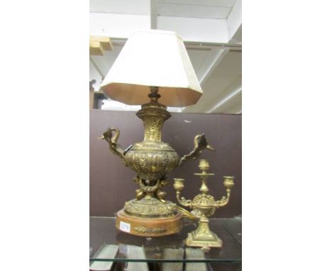 A metal table lamp with swan decoration (a/f) and a brass candelabra. COLLECT ONLY.