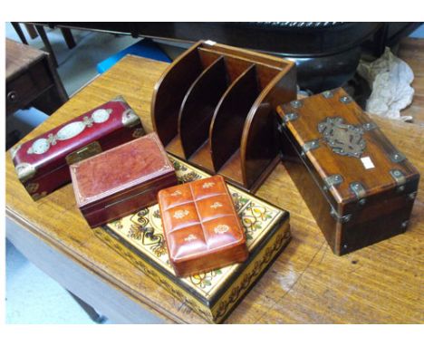 An Edwardian Mahogany three division desk top letter rack, a Victorian brass bound rosewood tea caddy, a Chinese jewellery bo