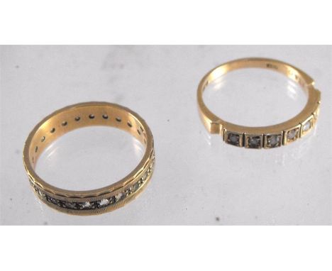 A 9ct gold half eternity ring set with diamonds, and a 9ct gold eternity ring (2) 